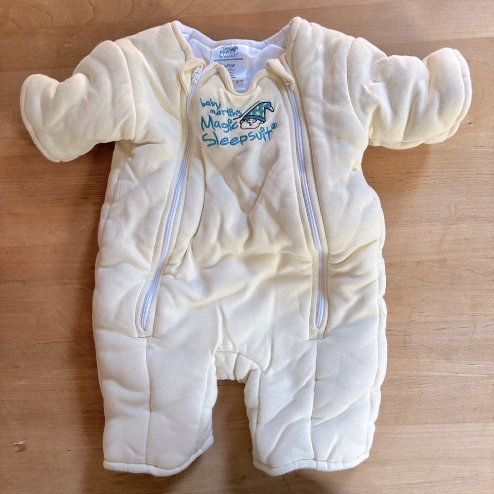 TWO baby Merlin magic sleep suits in yellow